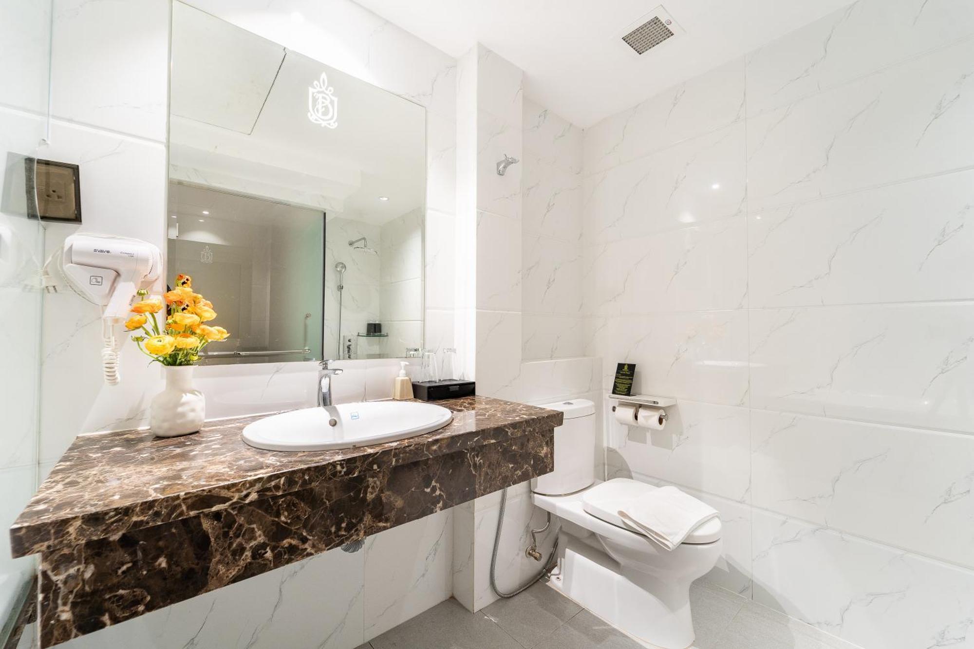 Nicecy Hotel Suites & Spa Хошимин Номер фото
